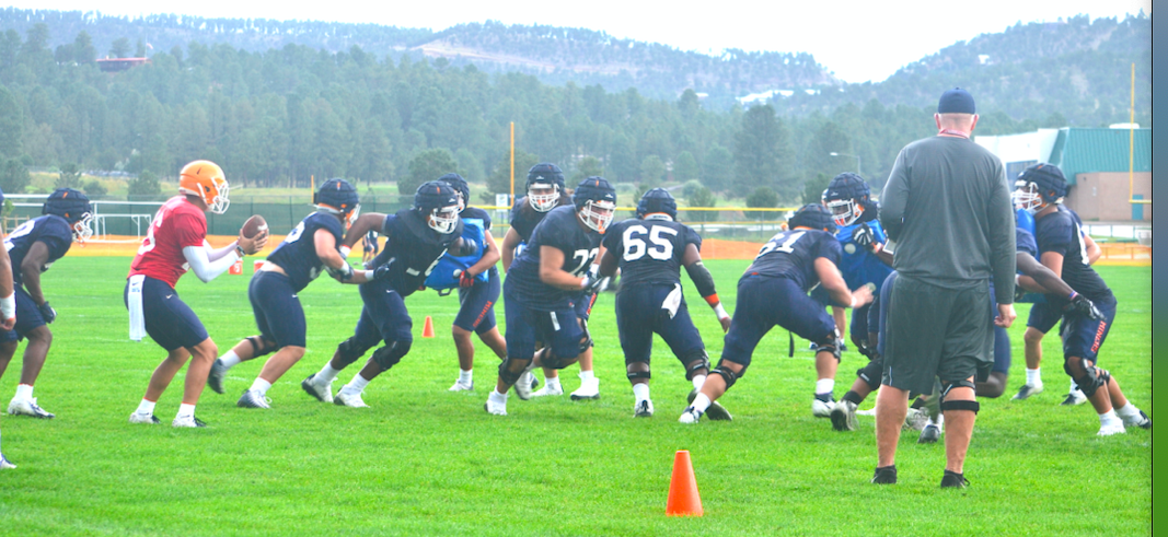 Coach Dana Dimel with player Derron Gatewood